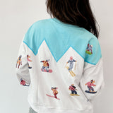 White/Blue Skiers On Mountain Sweatshirt