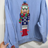 Powder Blue Skiing Nutcracker Sweatshirt | Queen Of Sparkles