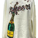 Ivory Popping Champagne 'Cheers' Sweater | Queen Of Sparkles