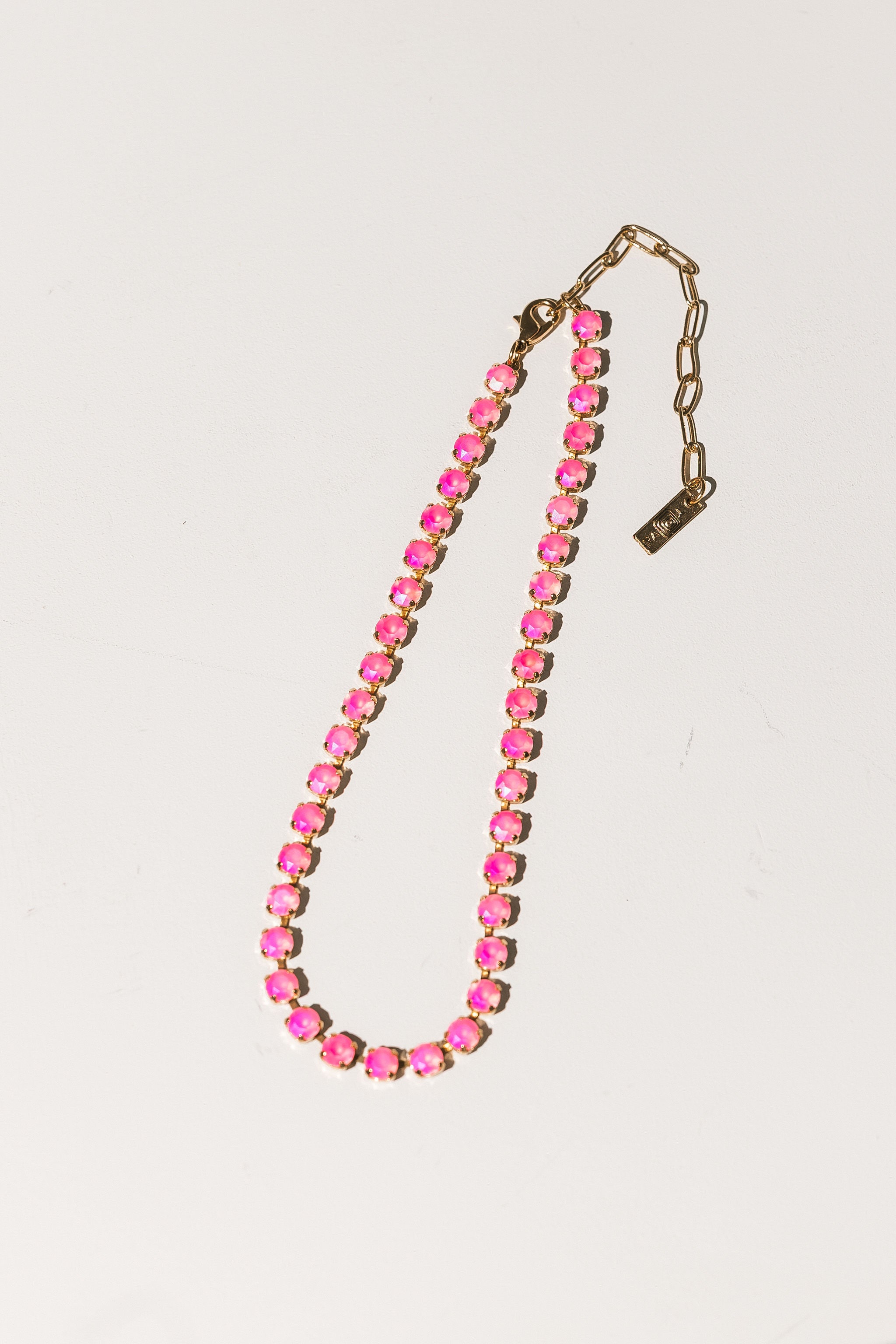 TOVA Sarina Necklace in Electric Pink Ignite Frost – detail view of electric pink crystal necklace