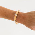TOVA Kennedy Cuff in Fairy Dust Peachfuzz – detail view of peachy shimmer crystal bracelet
