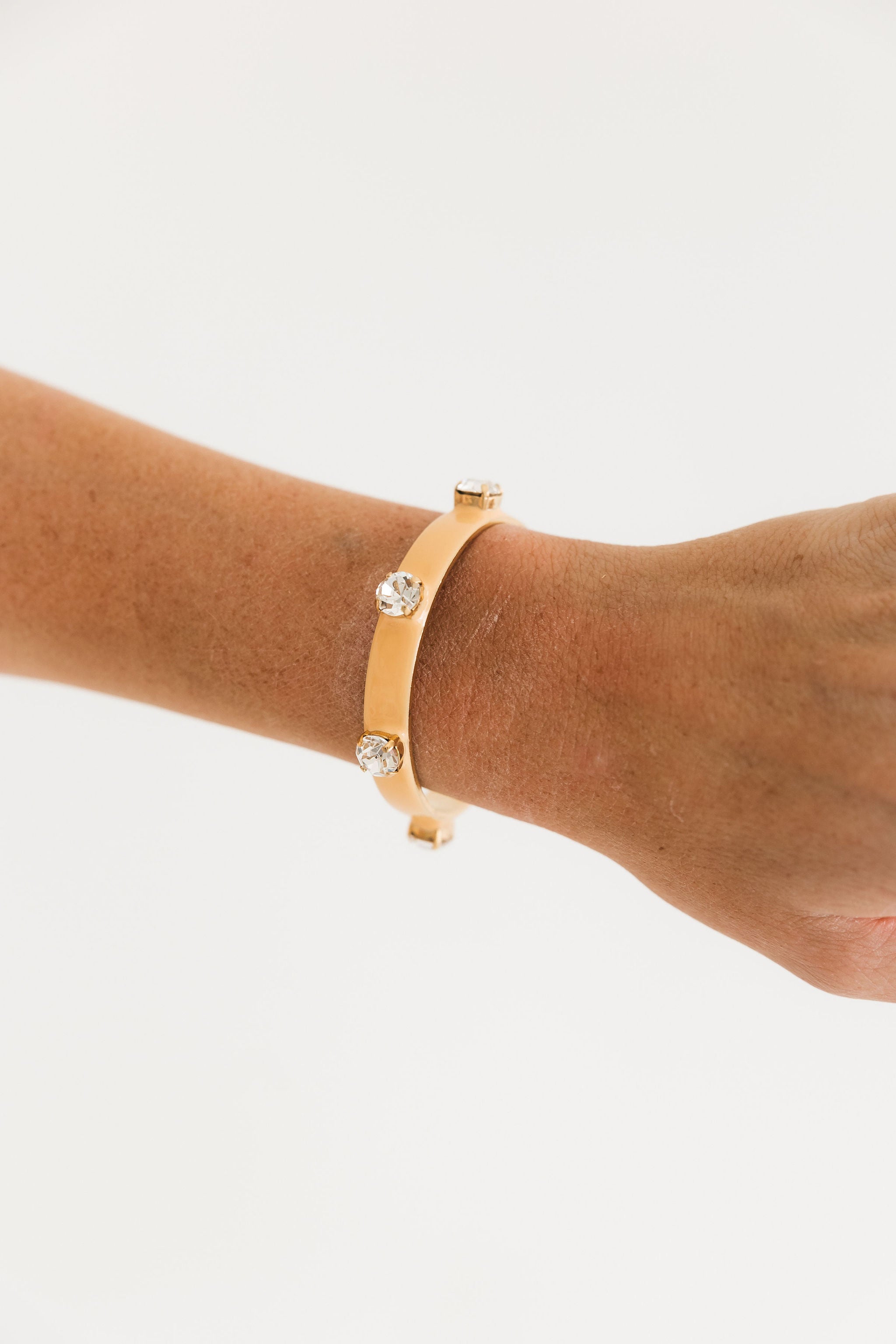 TOVA Kennedy Cuff in Fairy Dust Peachfuzz – detail view of peachy shimmer crystal bracelet