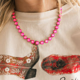 TOVA Oakland Necklace in Electric Pink Ignite Frost worn on model – vintage pink crystal necklace from Lexi Jade's Boutique