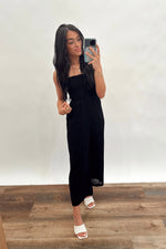 ALL SMILES SMOCKED JUMPSUIT | BLACK